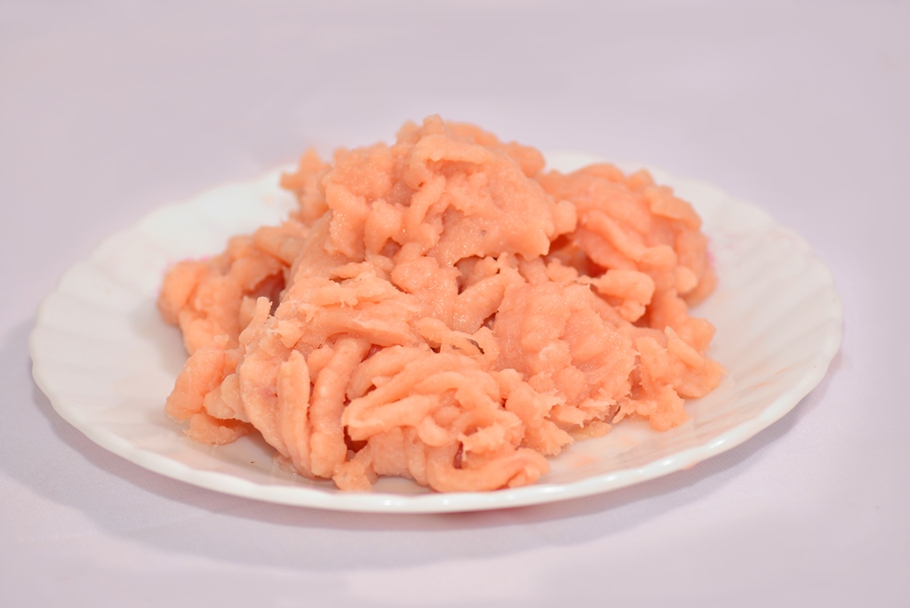 Skinless and boneless breasts and thighs are your best bet to make minced chicken. 